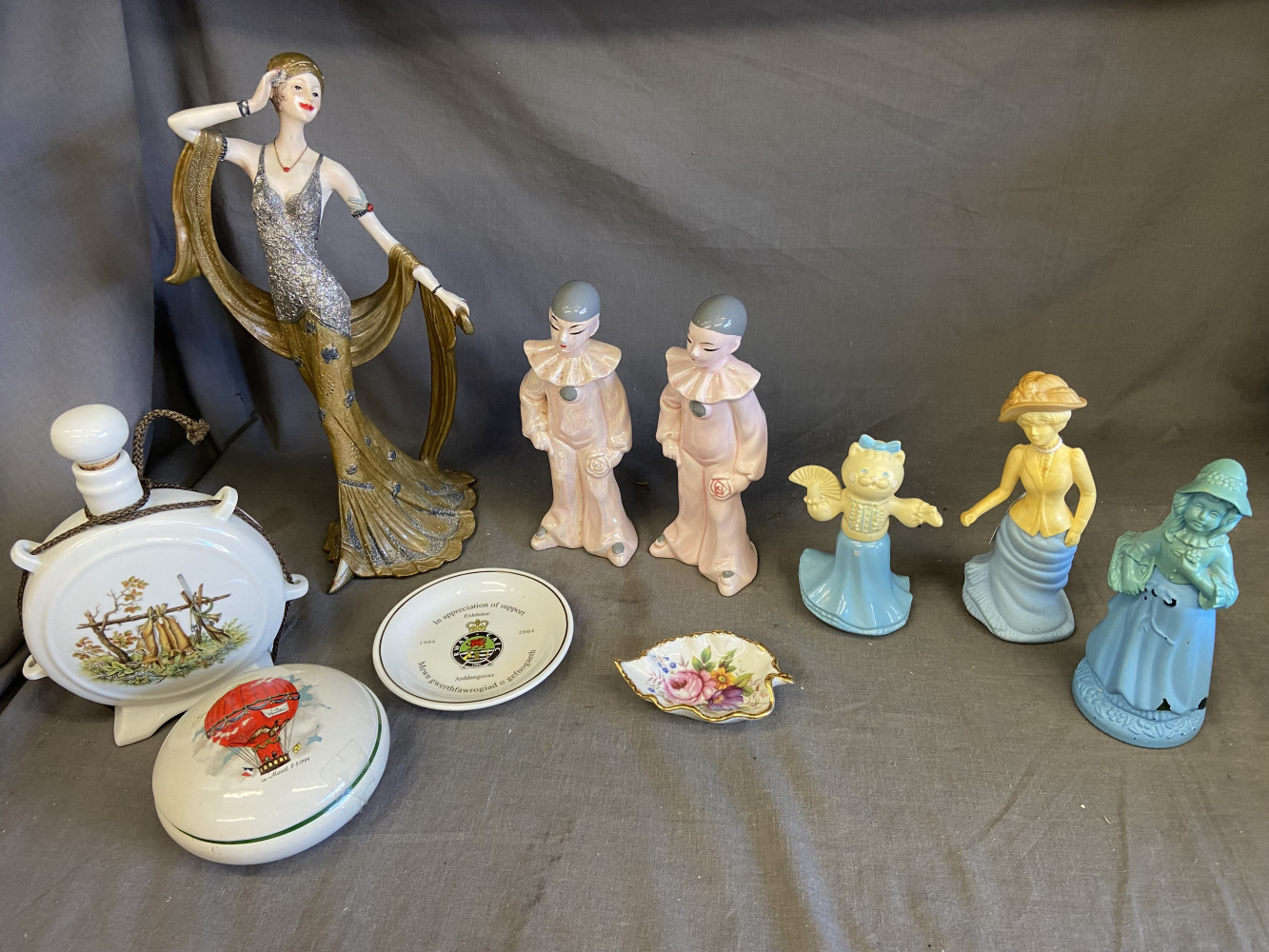 Tall figure, china and vintage Avon perfume bottles