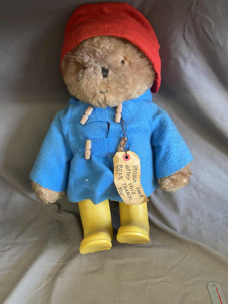 Original Paddington Bear with label and rare yellow boots, approx 50cms tall