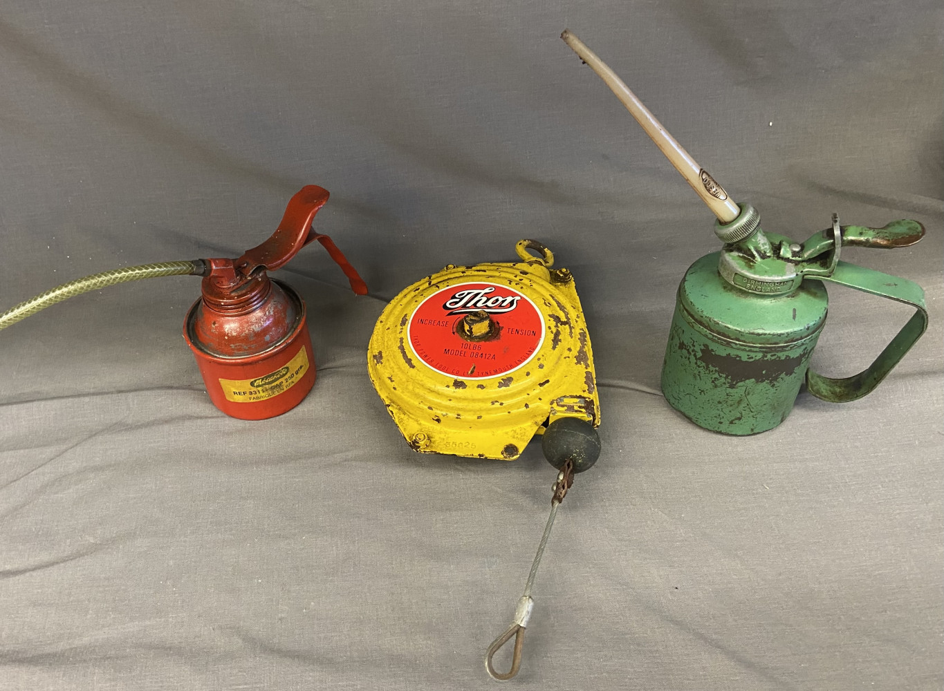 A Thor Cable Retractable Lifeline and two oil cans