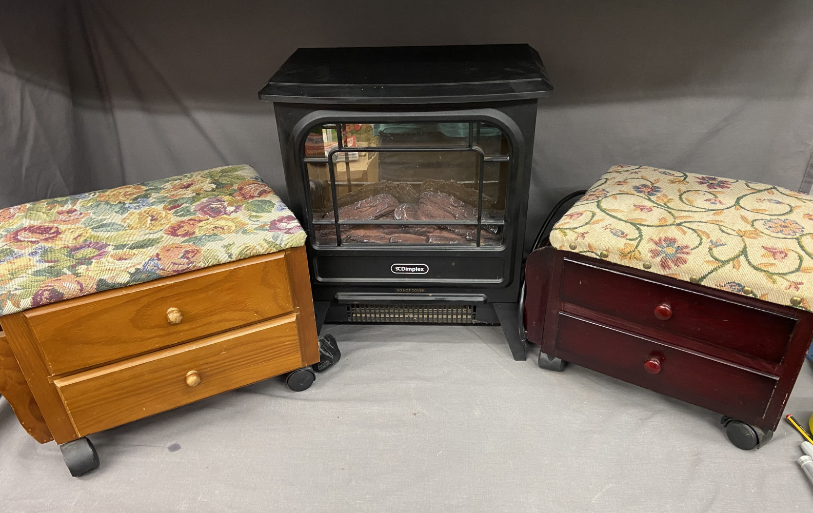 Little electric fire place and two sewing stools on wheels