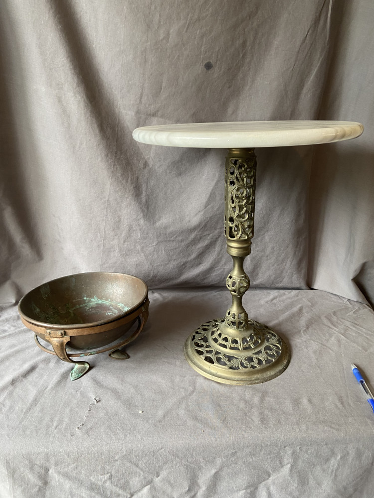 Antique copper bowl and heavy brass based table with marble top