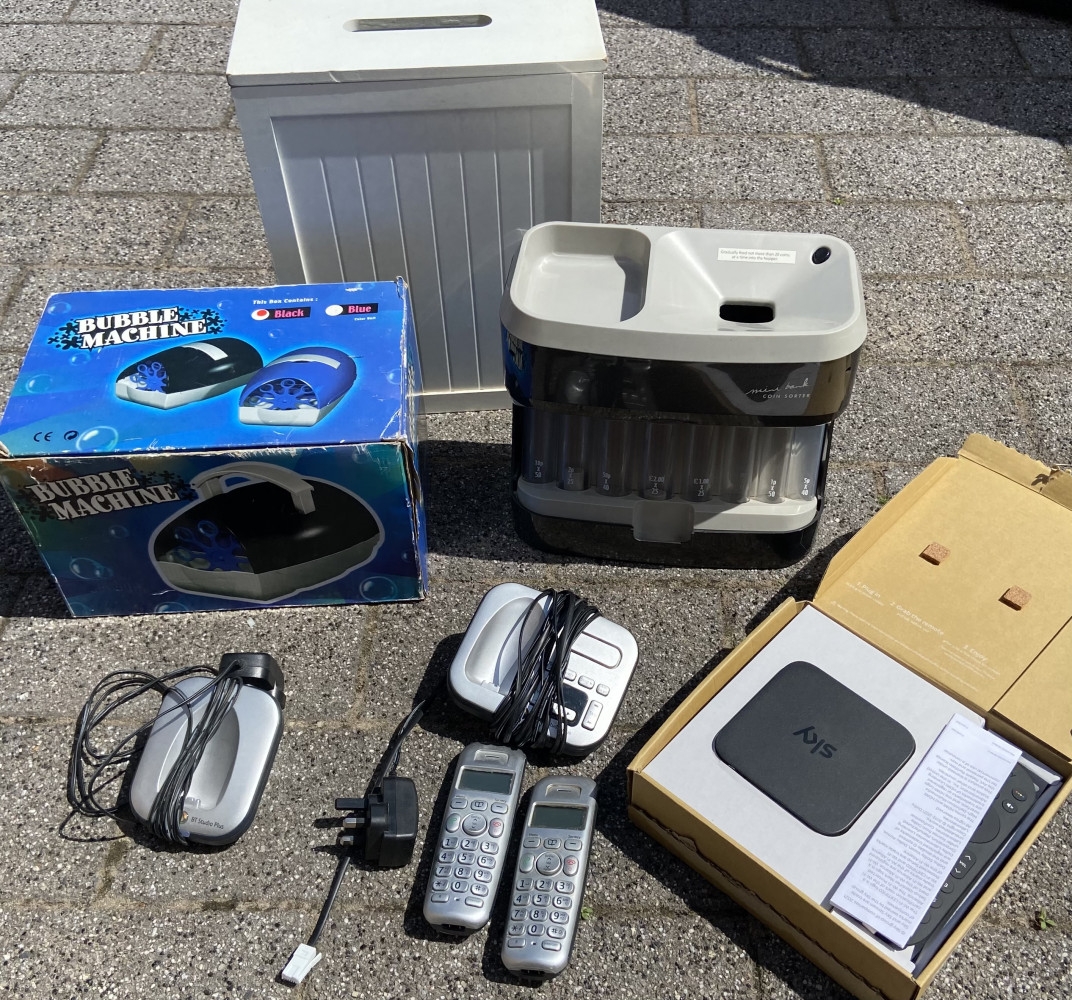 Sky Stream, phones, coin sorter, bubble machine and bathroom bin