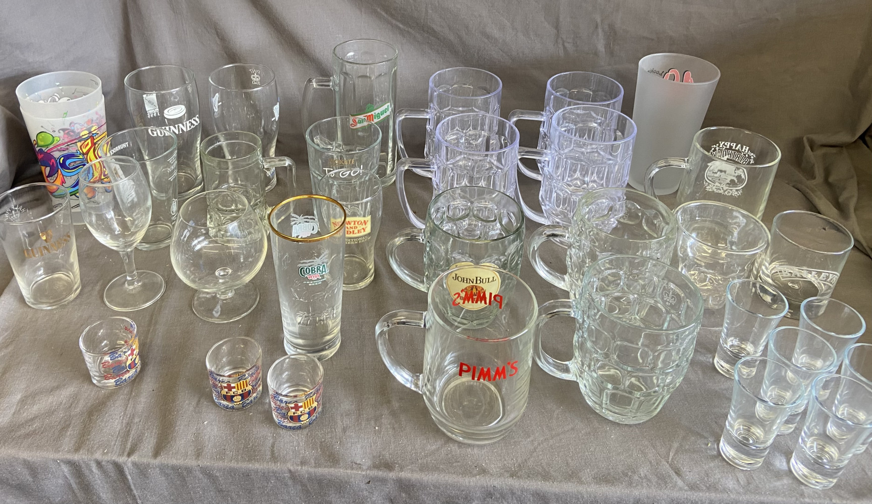 Large lot of bar glasses inc glass and plastic tankers