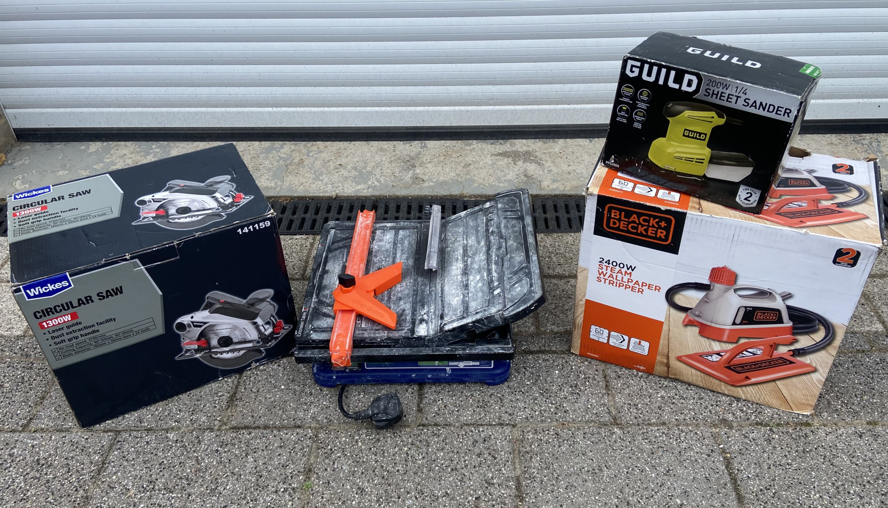 Tile cutter, circular saw, wall paper stripper and sander