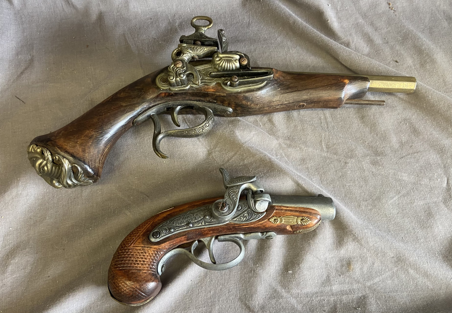 2 flintlock pistols