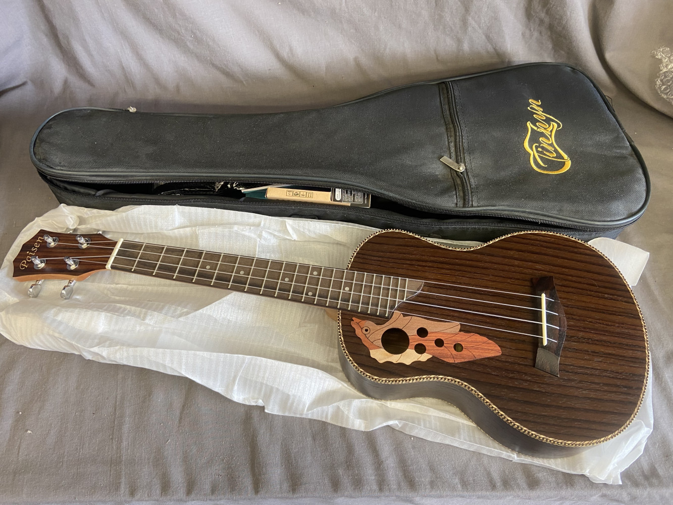 As new Ukelele, never been used only unwrapped for pictures