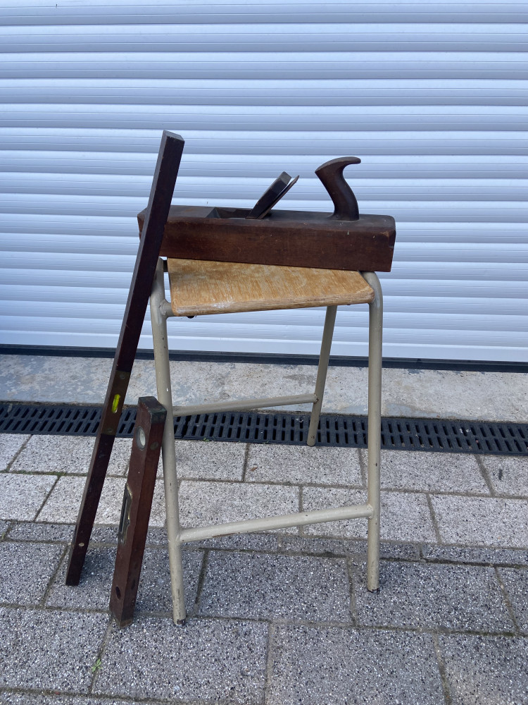 Large wooden plane, vintage school stool and two spirit levels
