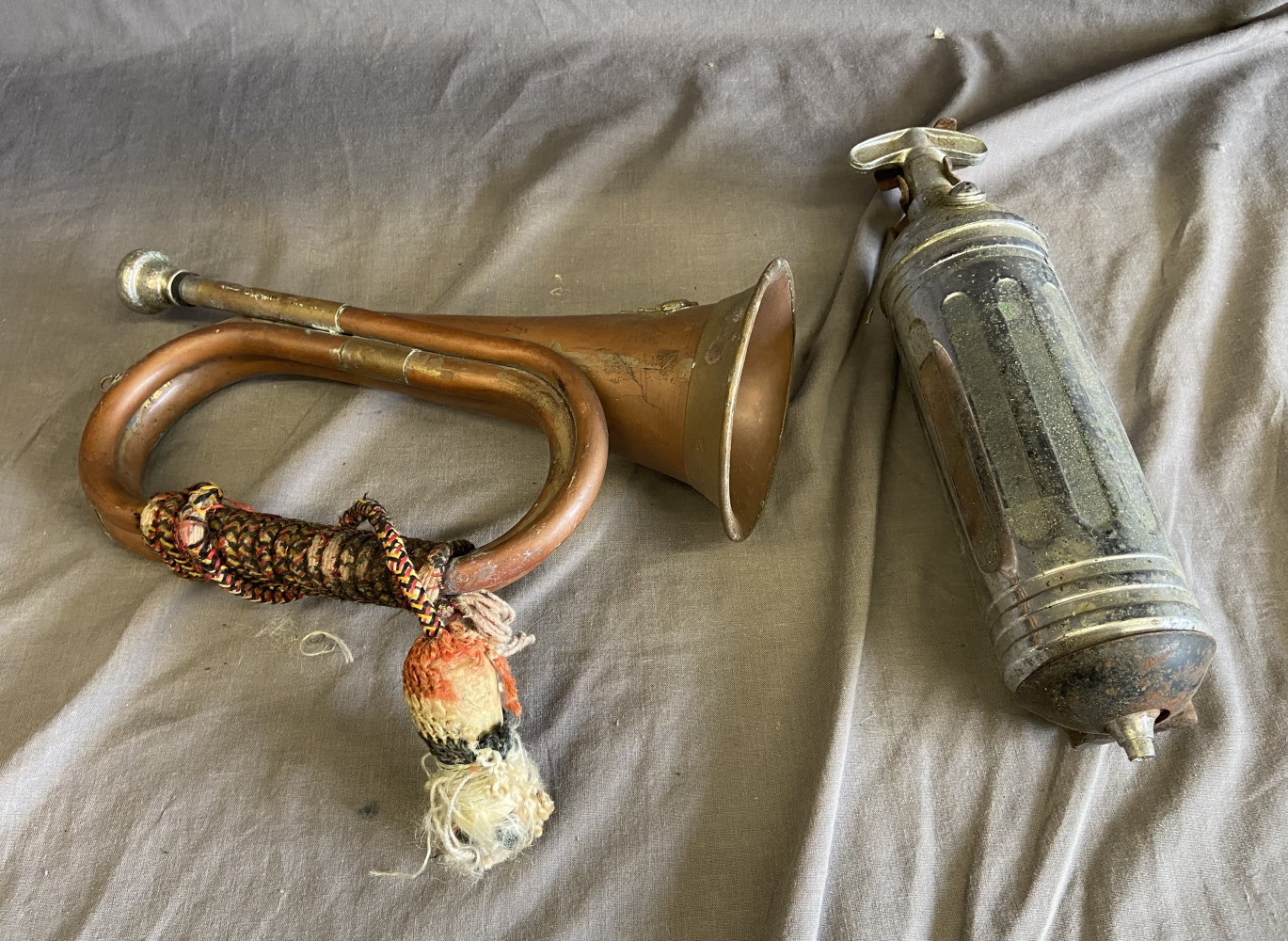 Bugle and vintage fire extinguisher