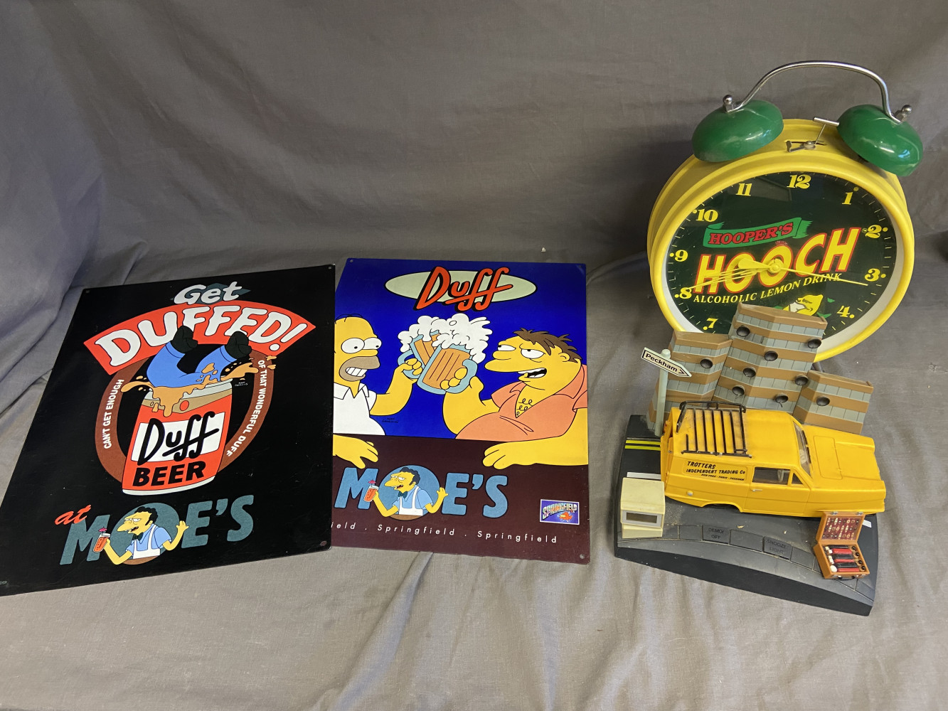 Duff beer signs, large hooch alarm clock and Del Boy alarm