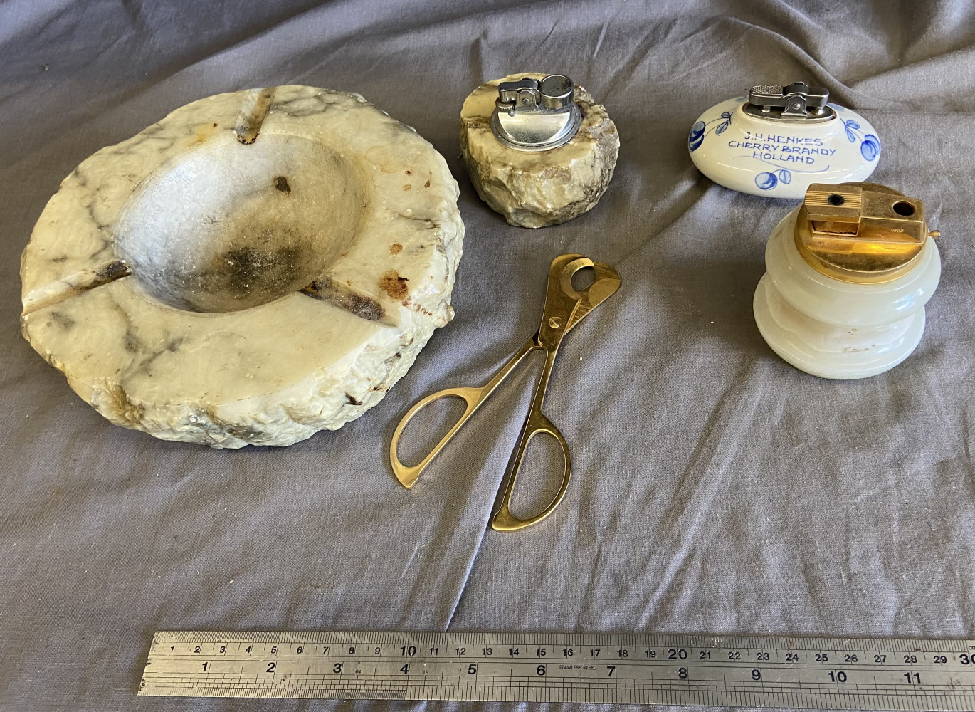 Large heavy onyx ash tray with matching lighter, cigar cutter and two other lighters one Azizoff