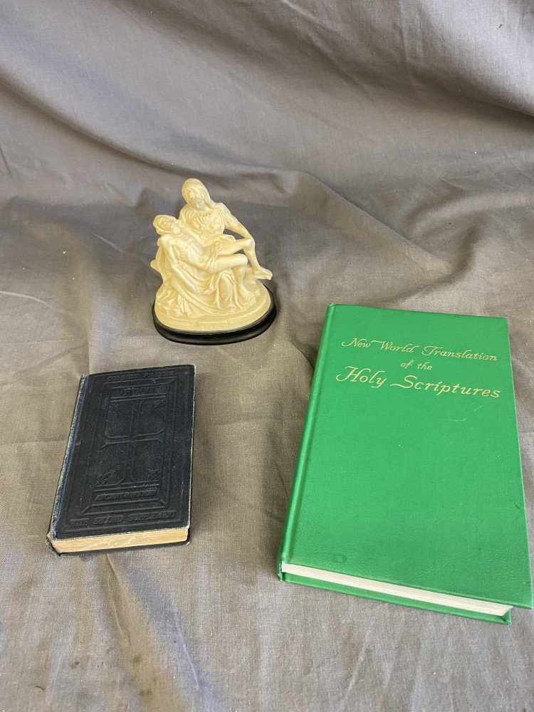 Religious books and figure