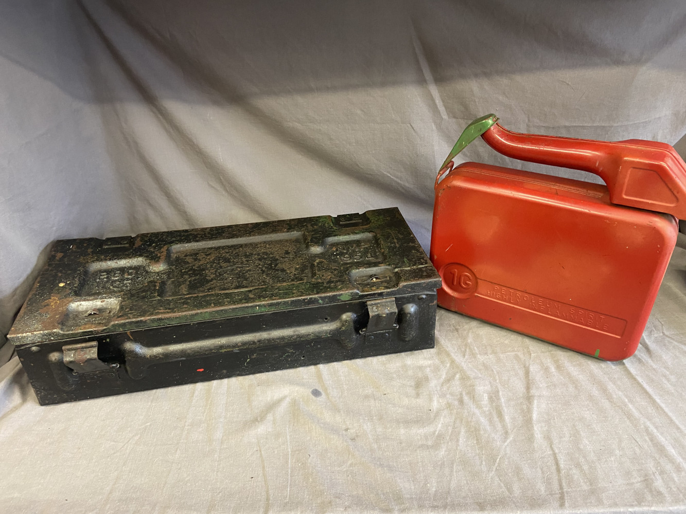Military metal box and vintage oil can
