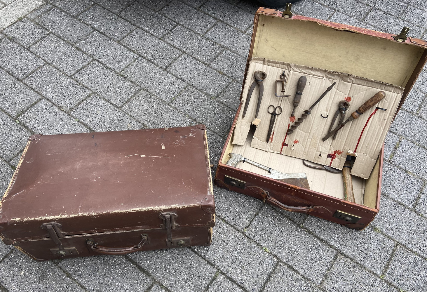 2 vintage suitcases one with some old tools