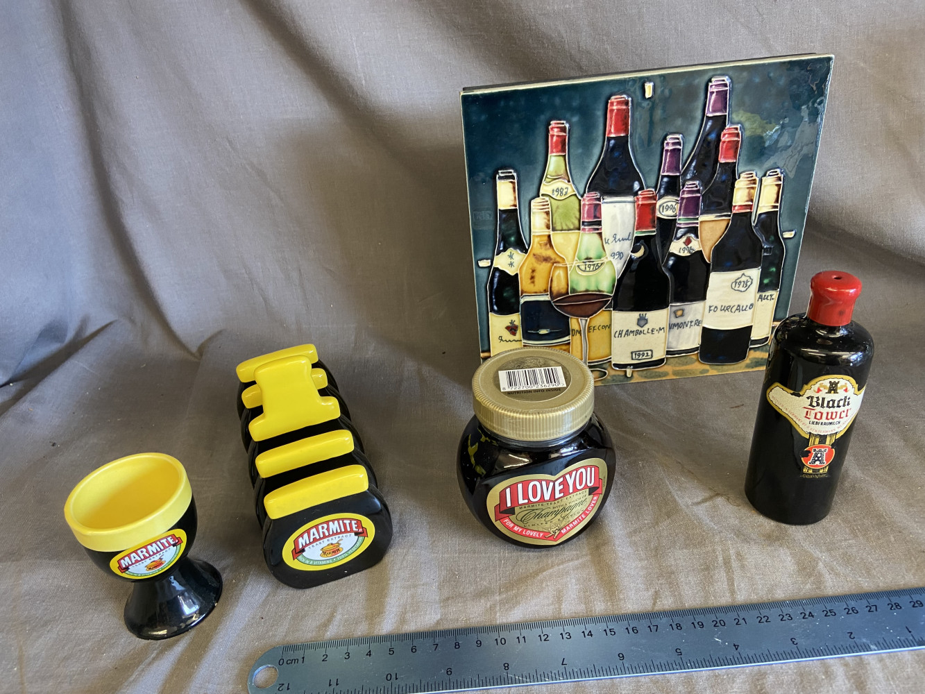 Marmite Collectables, wine salt bottle and tile clock face