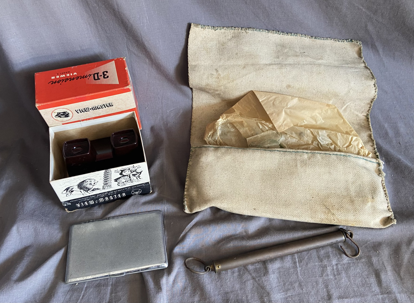 Scales, fishing bits, metal card holder and viewer in original box