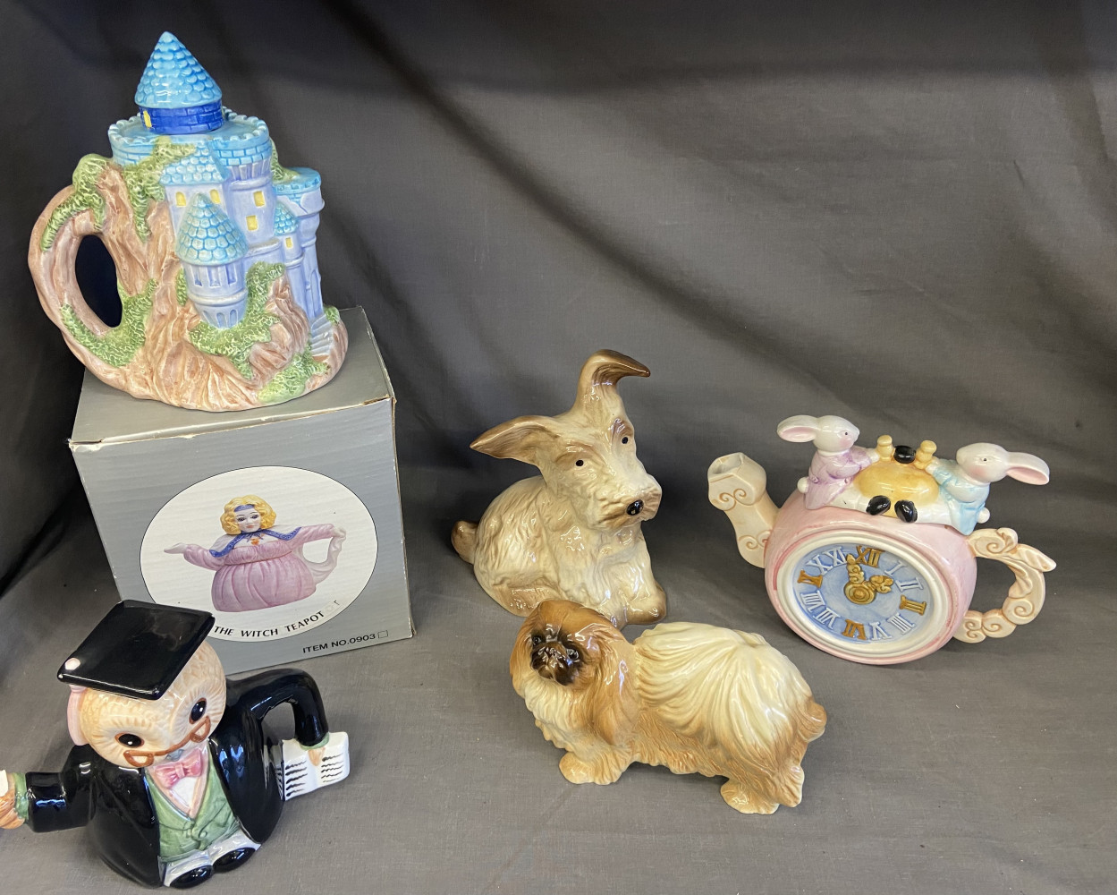 3 Teapots and two dog figures, owl teapot as found