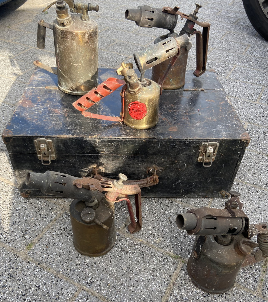 Wooden box with 5 brass torches