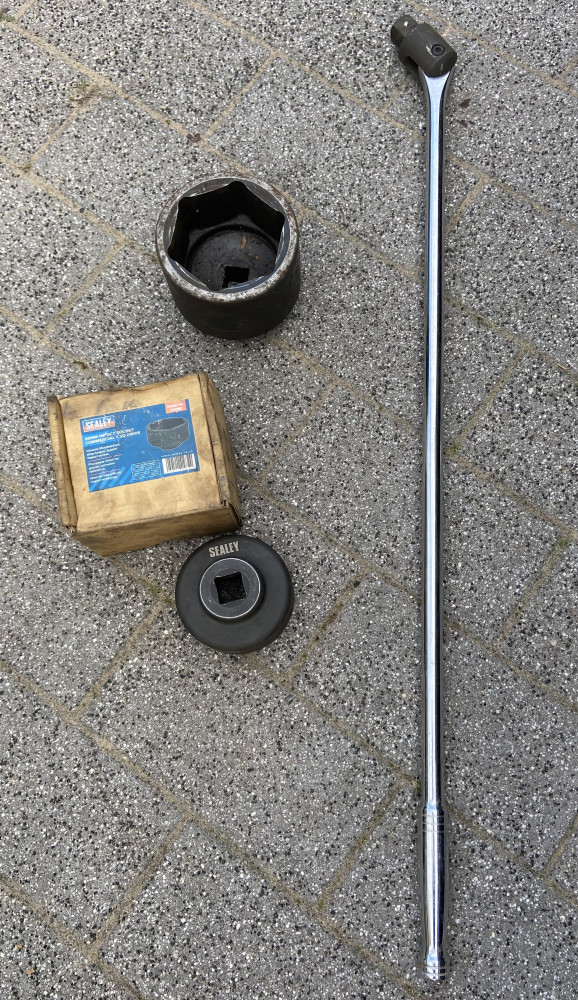 Huge 105mm socket, and sealy 90 socket a large breaker bar