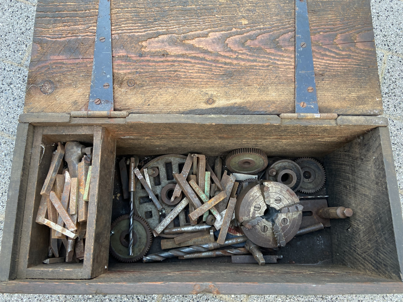 Wooden box full of lathe tools including small chuck