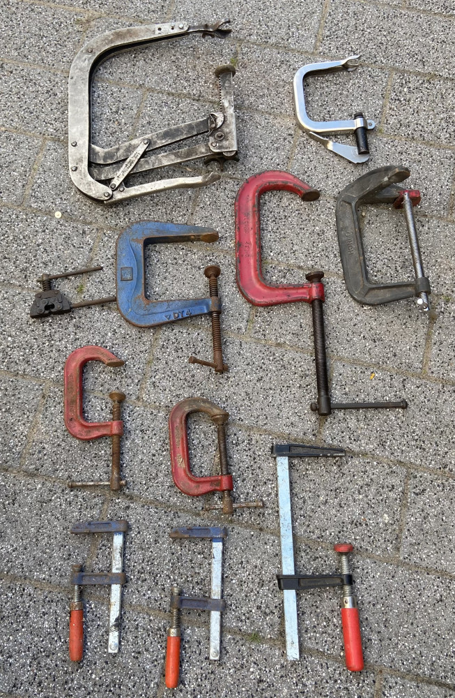 Large lot of clamps including 2 valve spring