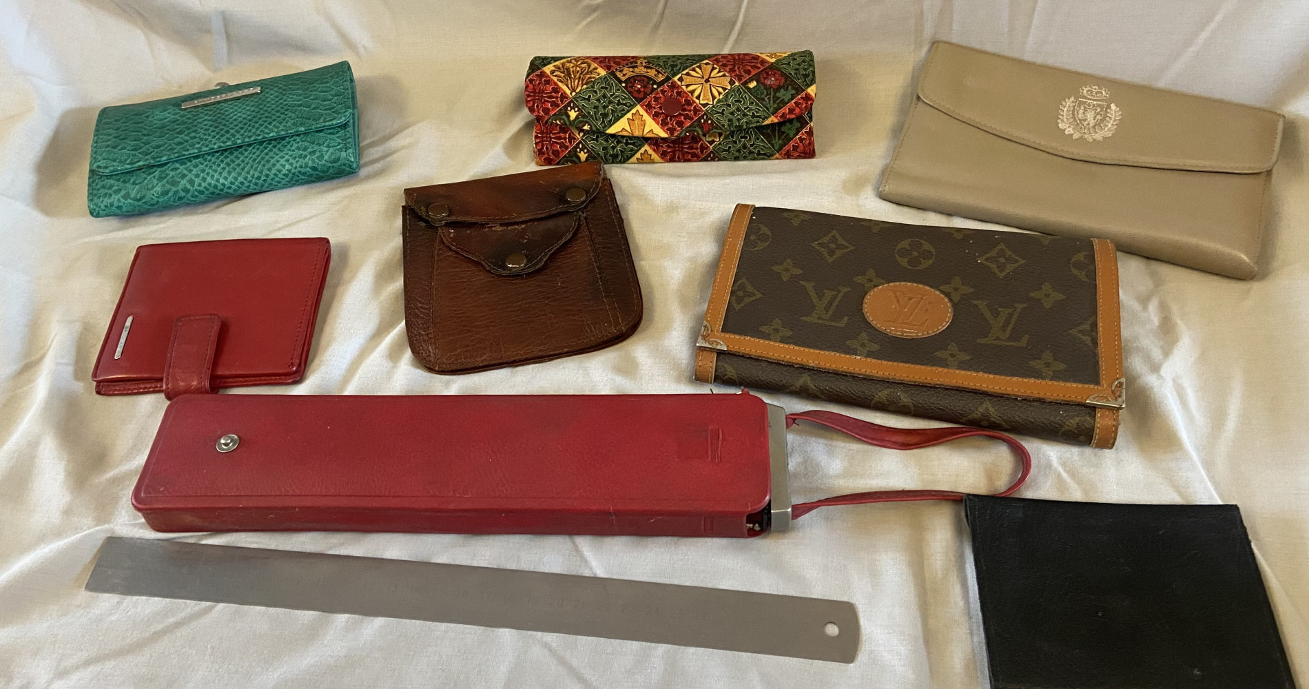 Vintage and modern purses, glasses and umbrella