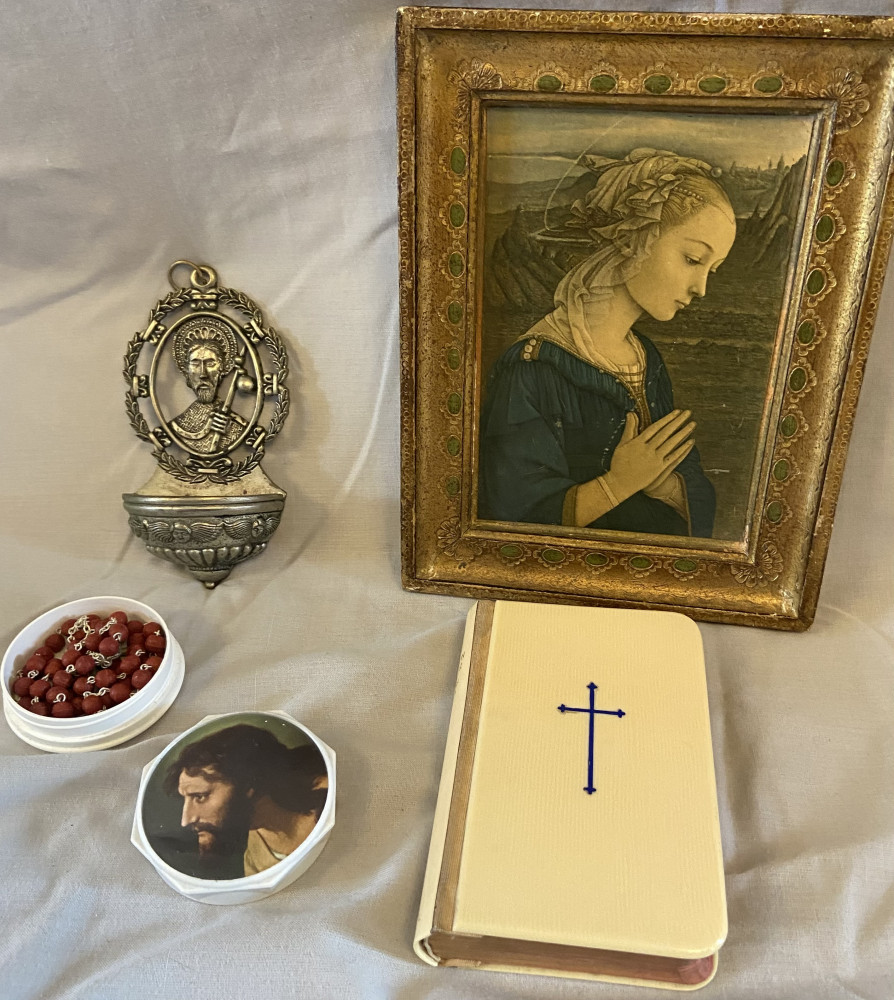 Religious items including rosary and bible
