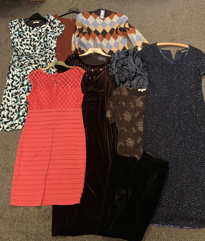 Womens dresses and tops and pair of trousers