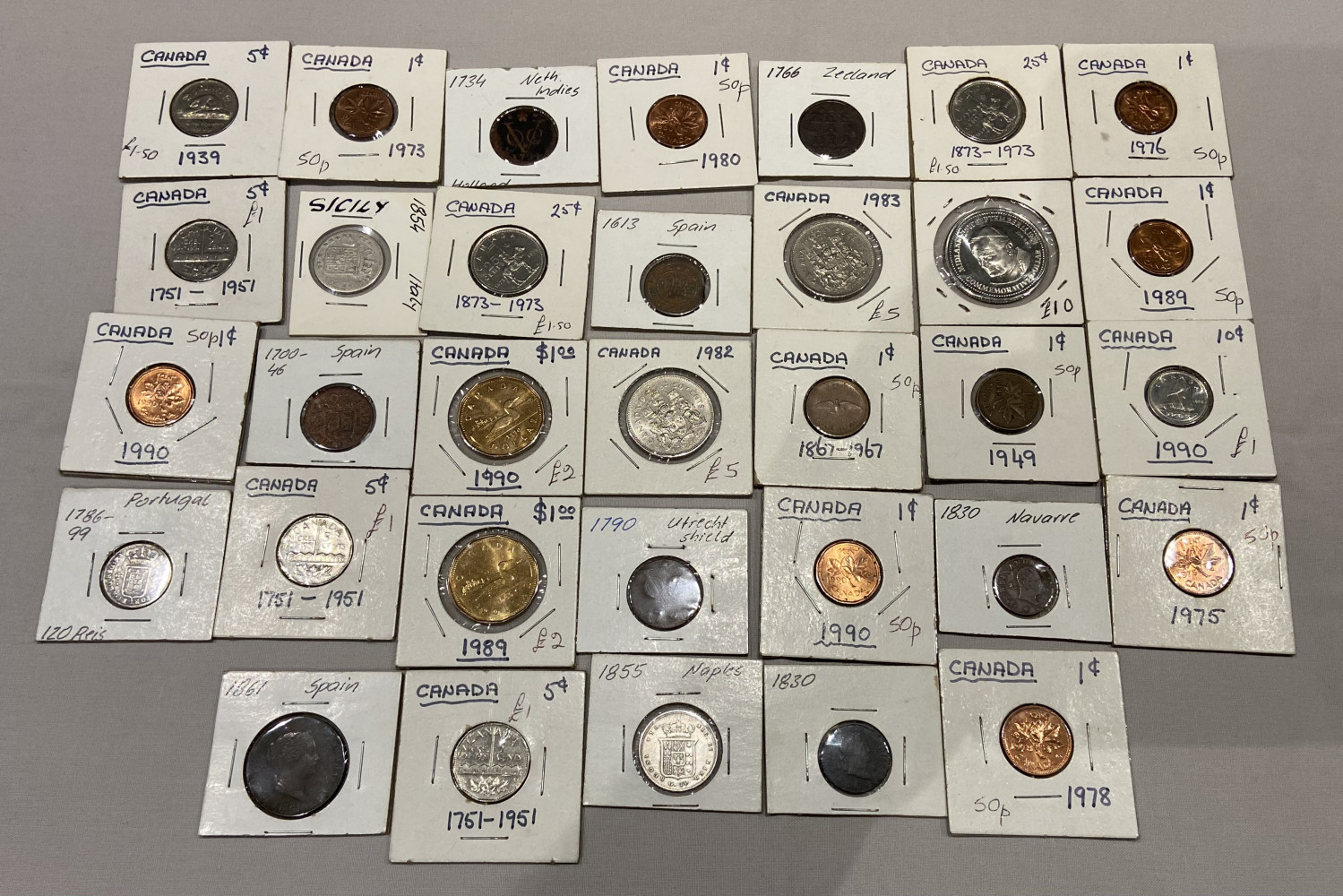 Large collection of coins mostly sorted and labelled