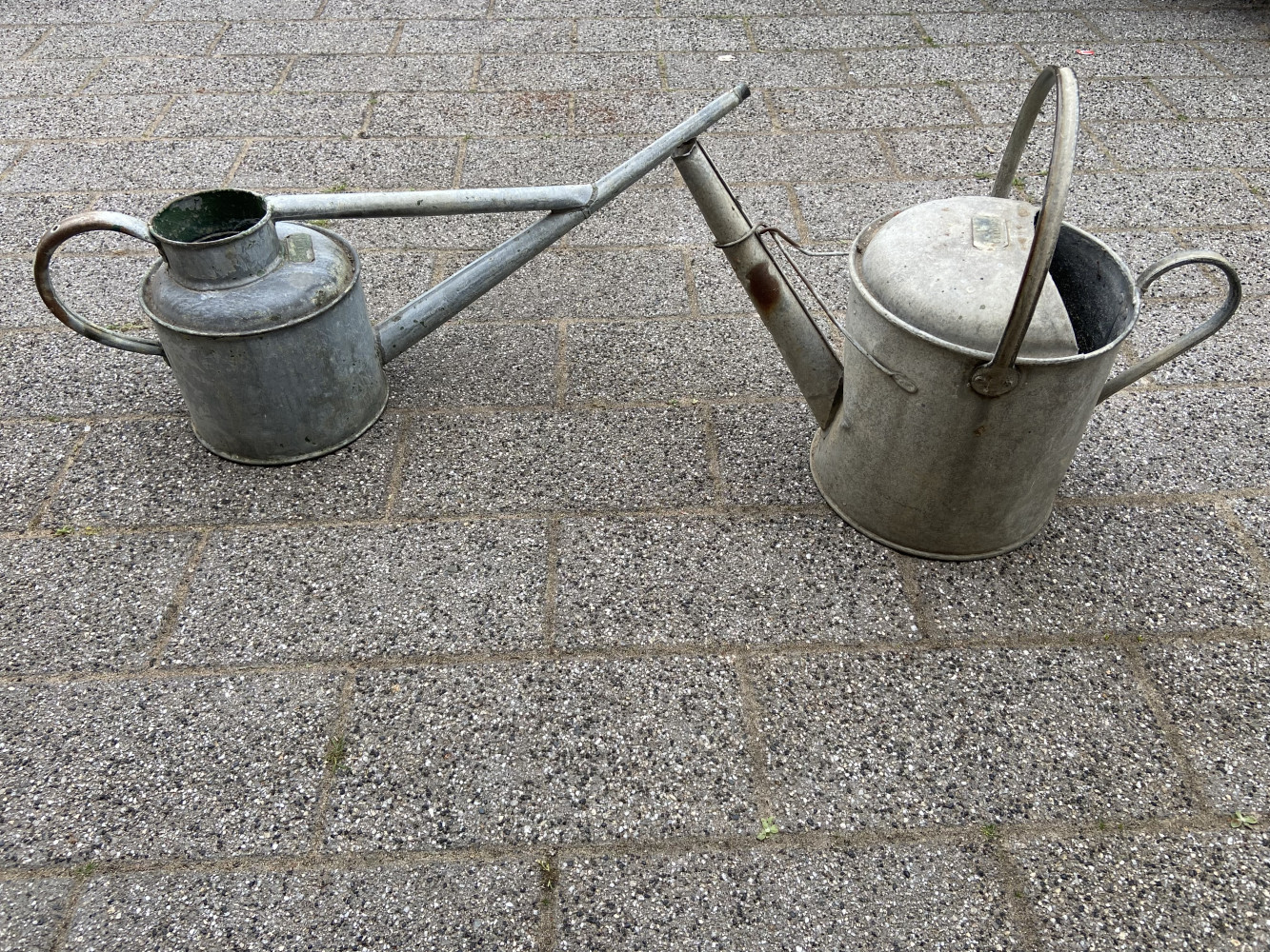 2 large metal galvanised watering cans