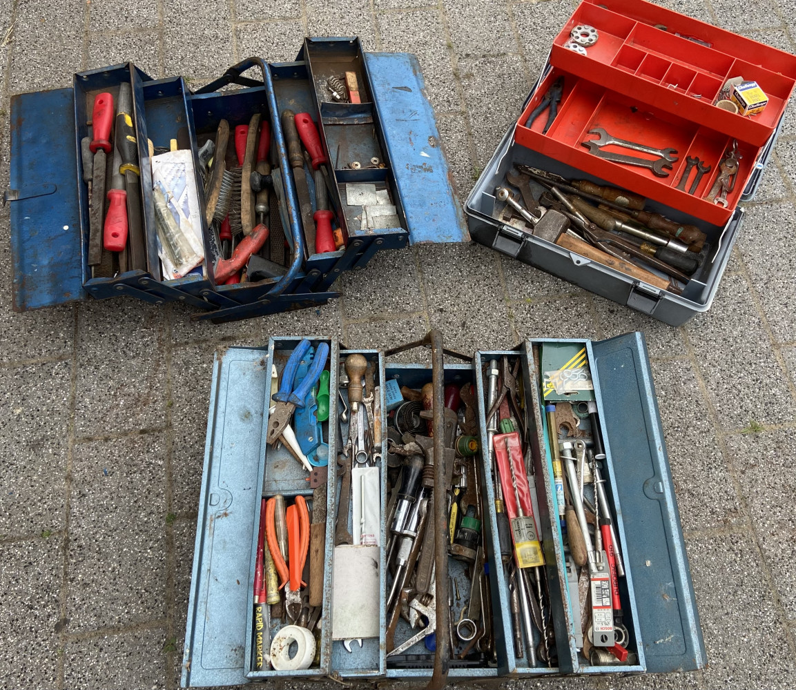 3 mixed tool boxes loaded with tools