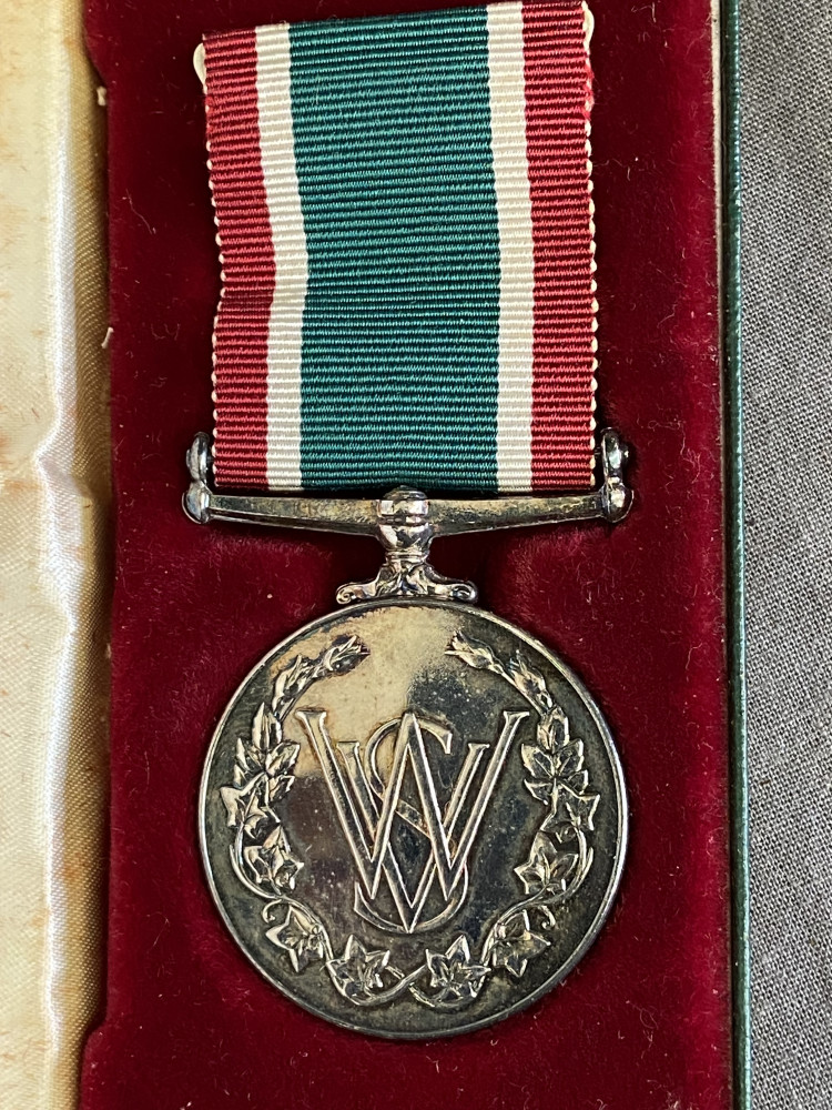 Women's Royal Voluntary Service (WRVS) medal in its original presentation case from the Royal Mint