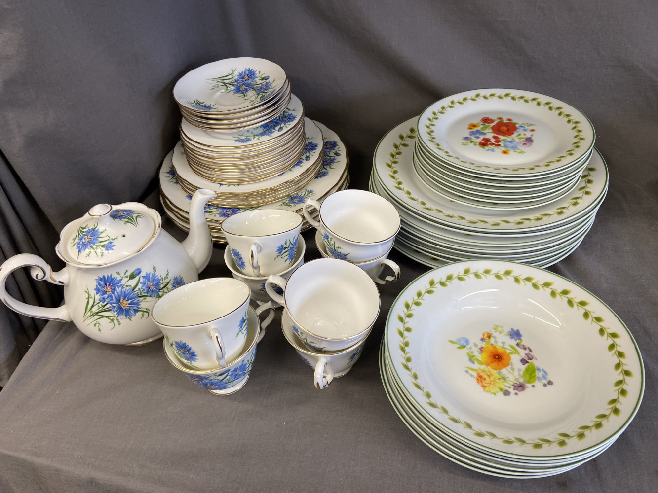 2 large sets, one with tea service,