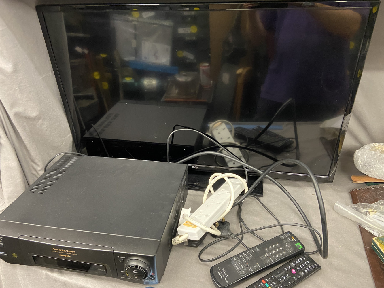 Bush television and video player with remotes