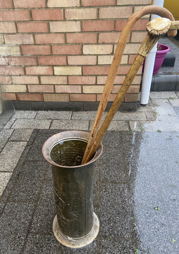 Brass umbrella stand with 2 sticks one with horn top