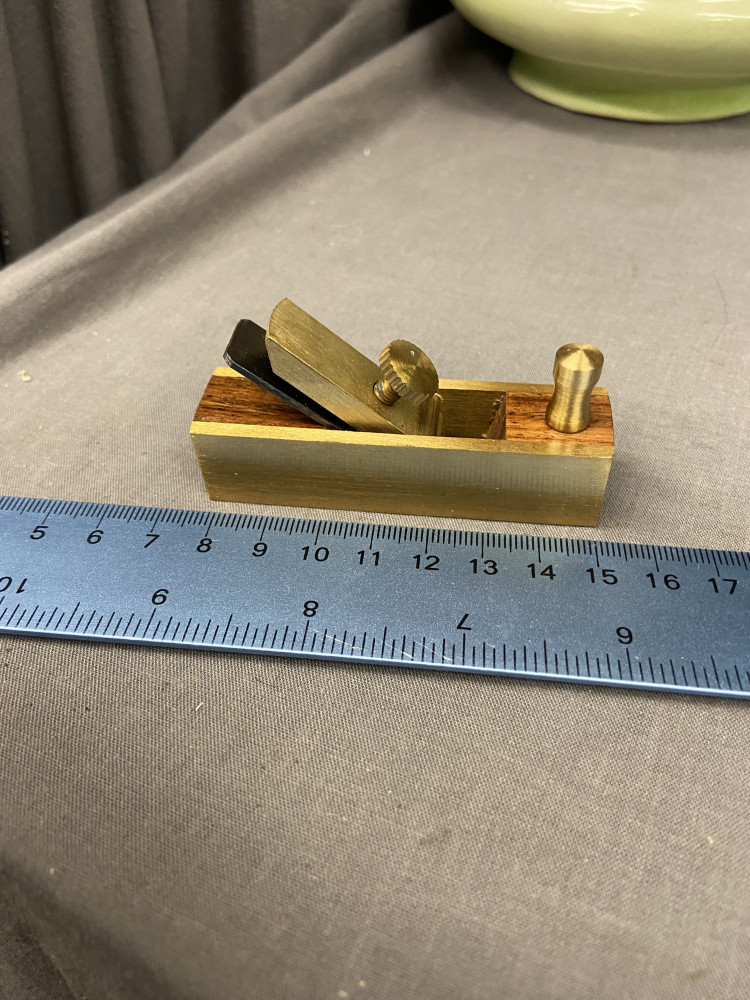 Very small brass plane