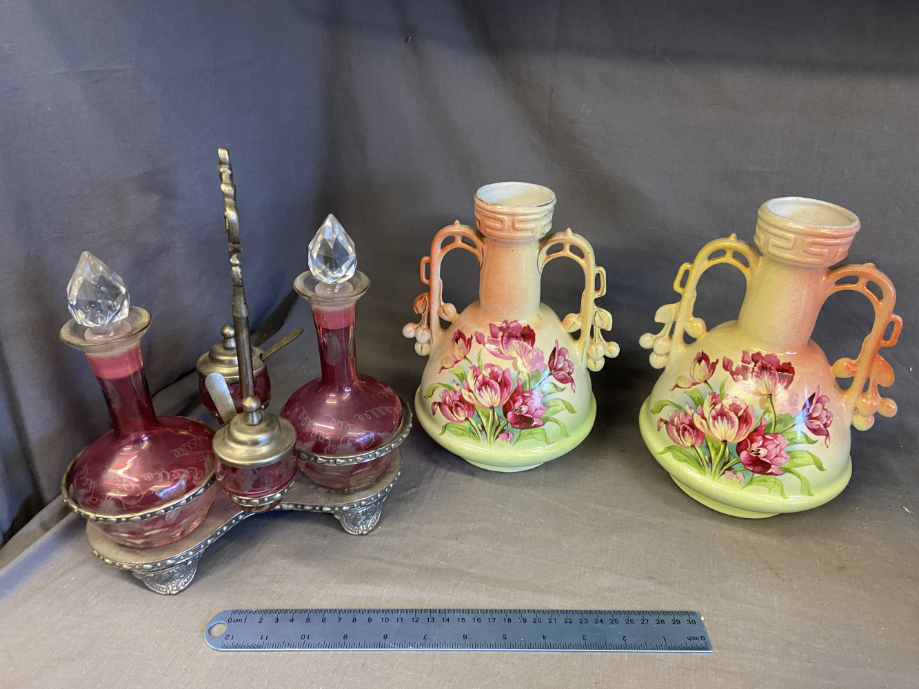Cranberry glass victorian oil decanters and Hand painted victorian porcelain Vases.