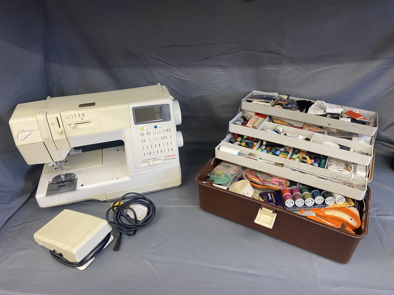Singer Concerto 4 sewing machine and sowing box which is fully loaded