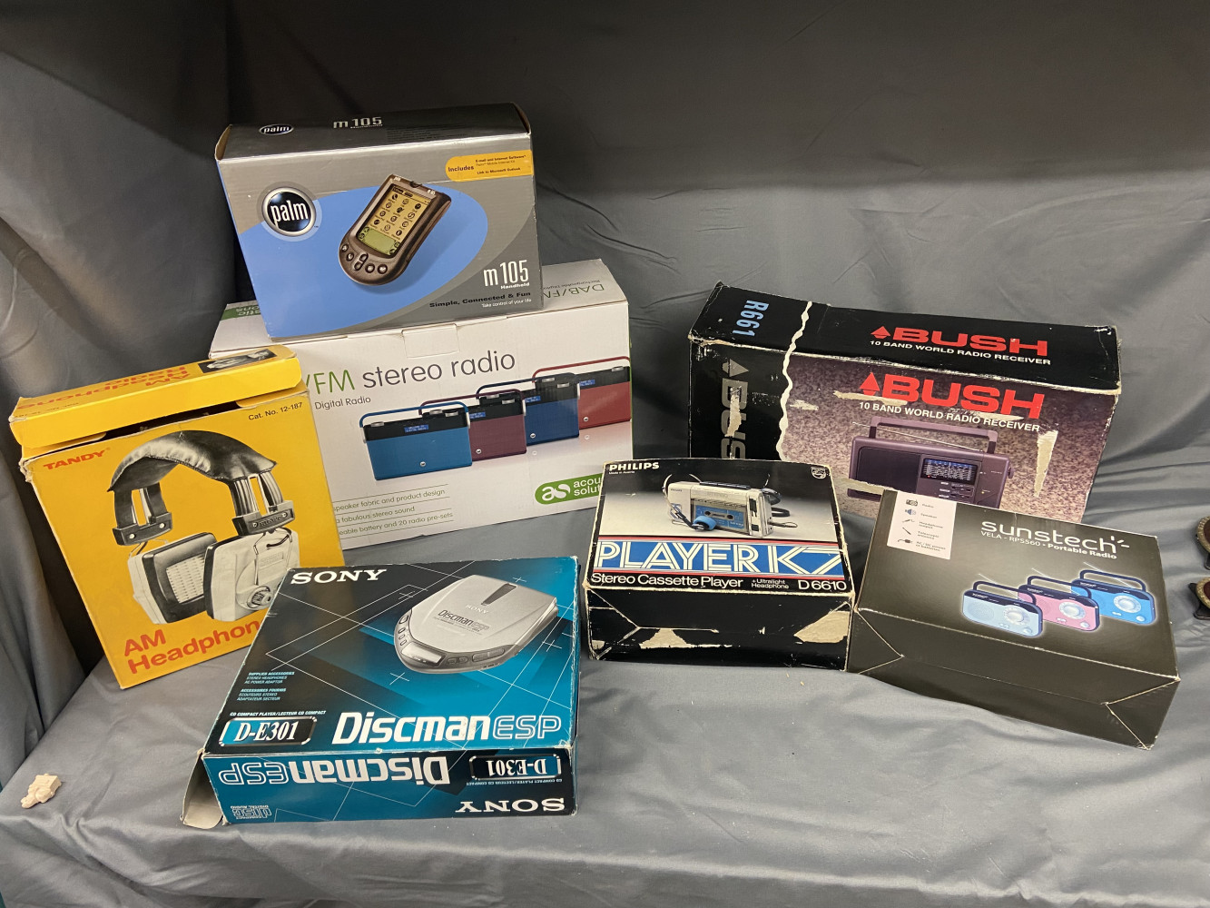 Radios some new some vintage, boxes discman, palm internet device and boxed Tandy headphones