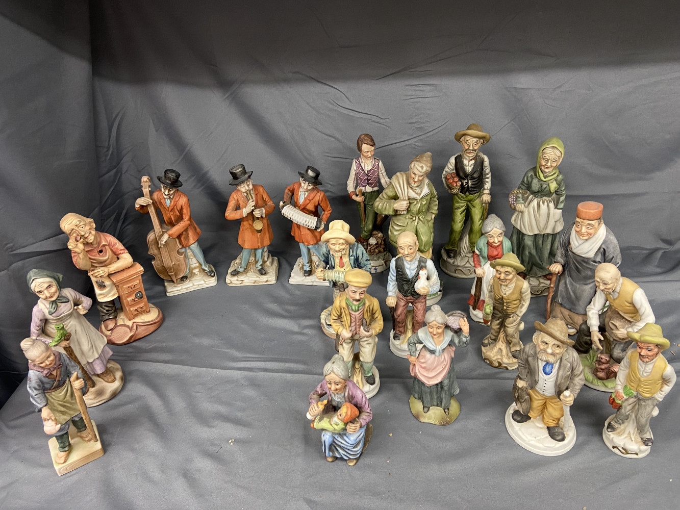 Collection of medium sized vintage Capodimonte and Capodimonte-style ceramic figurines