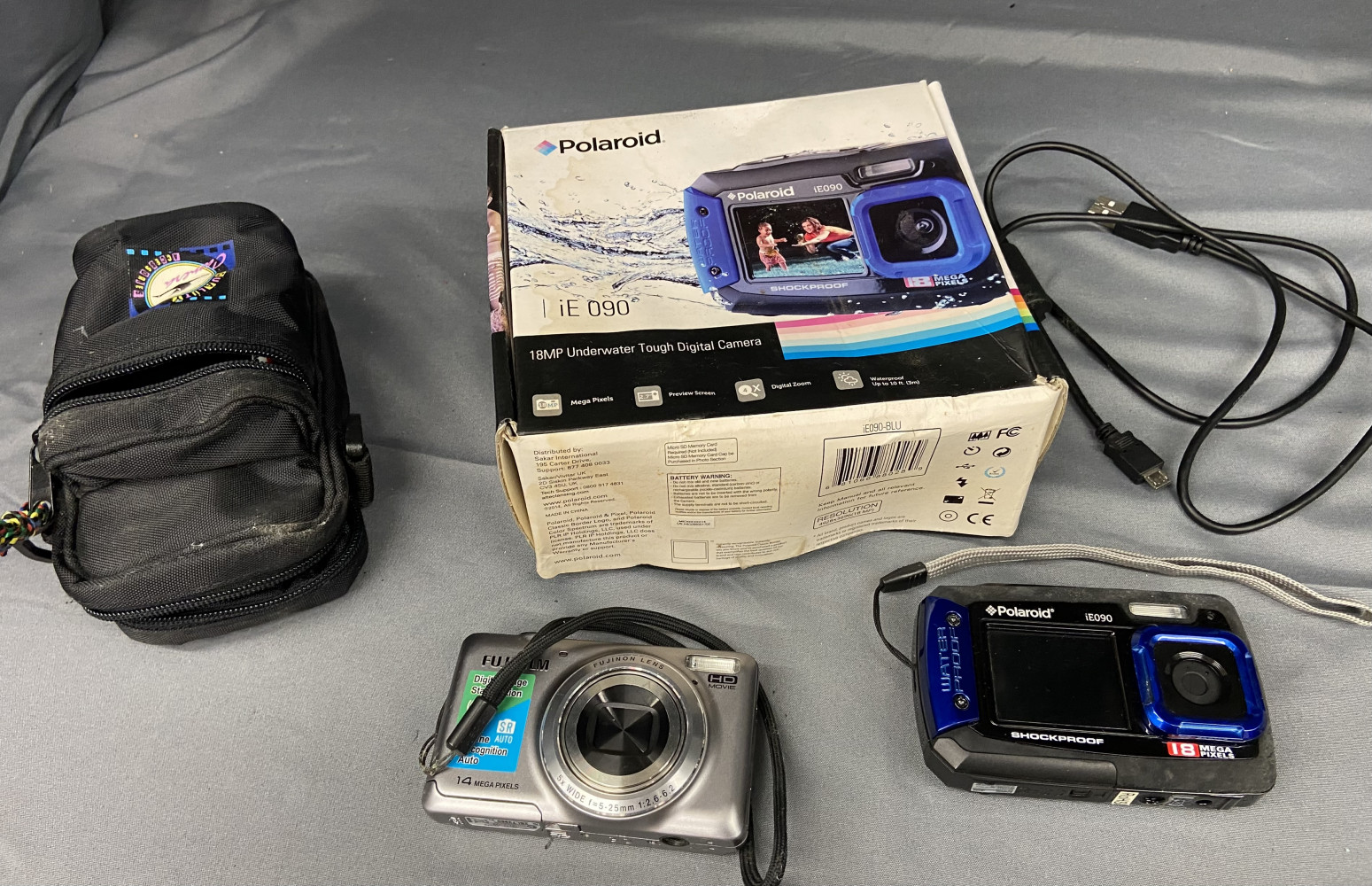 2 Digital Cameras and a case