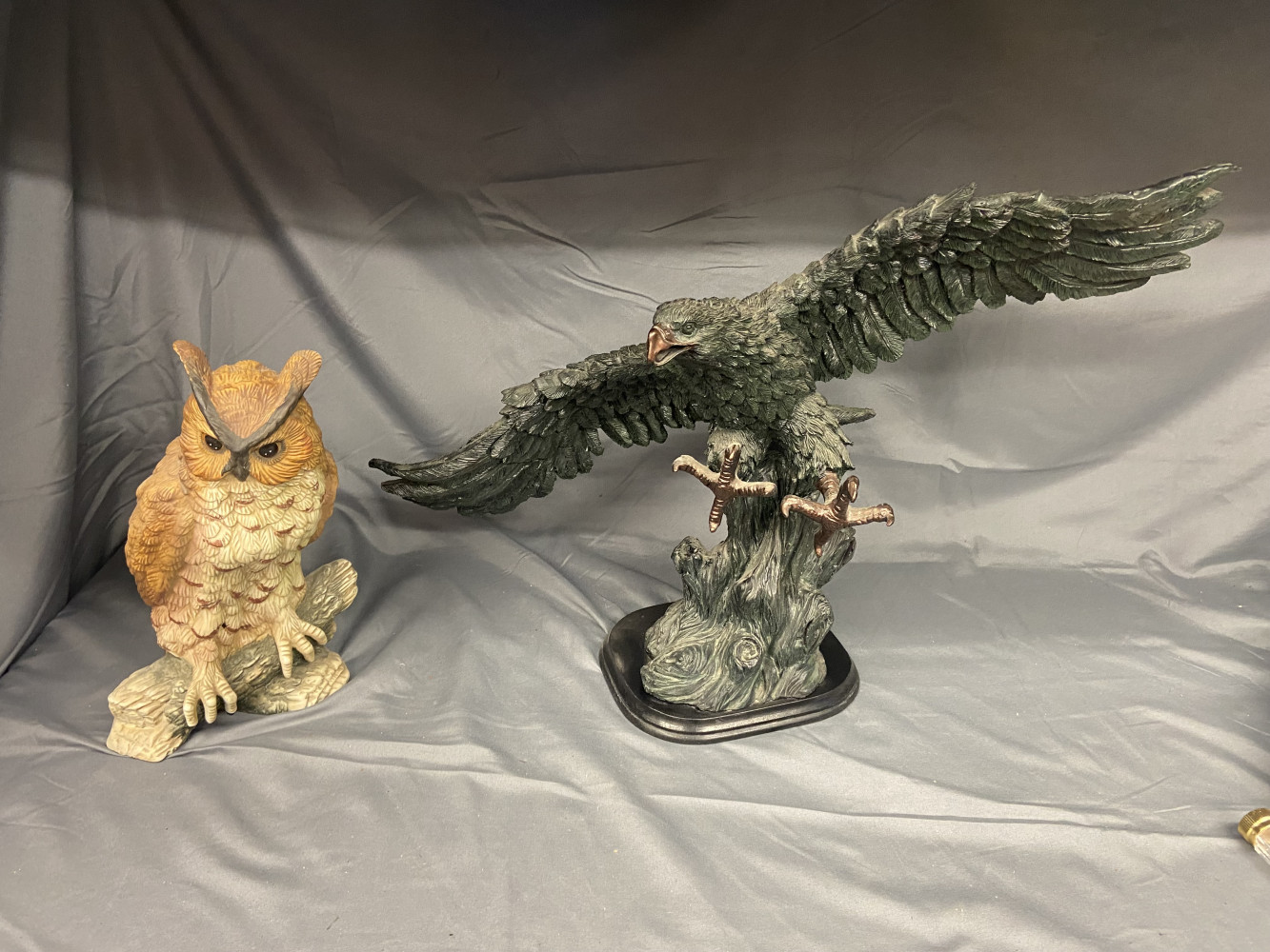 Large Falcon and owl figurines, slight mark on tail of eagle