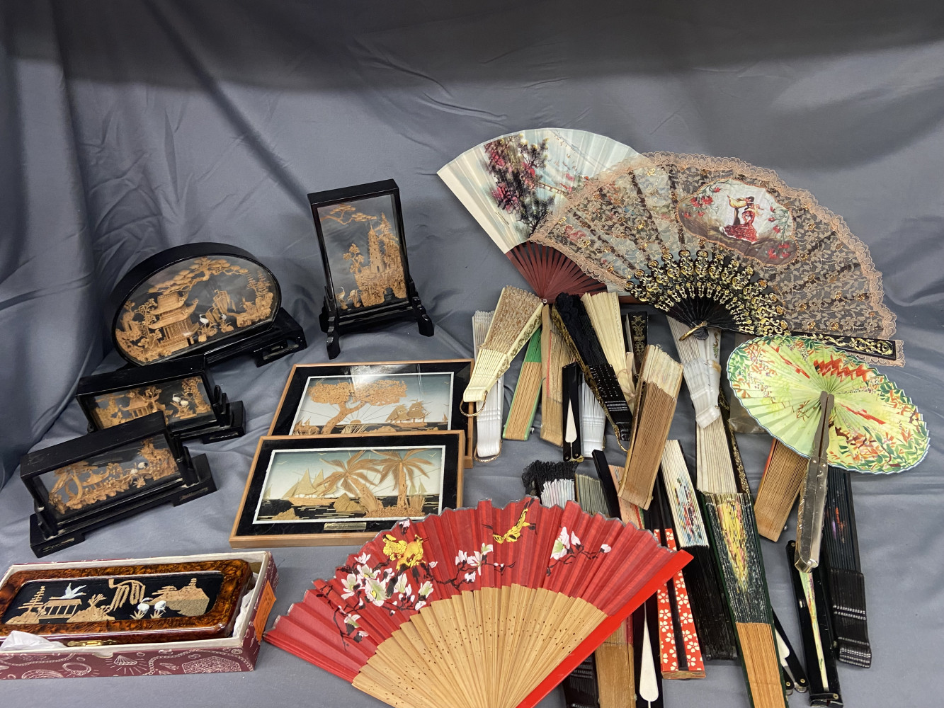 Collection of vintage Chinese handcrafted cork carving dioramas and large lot of fans