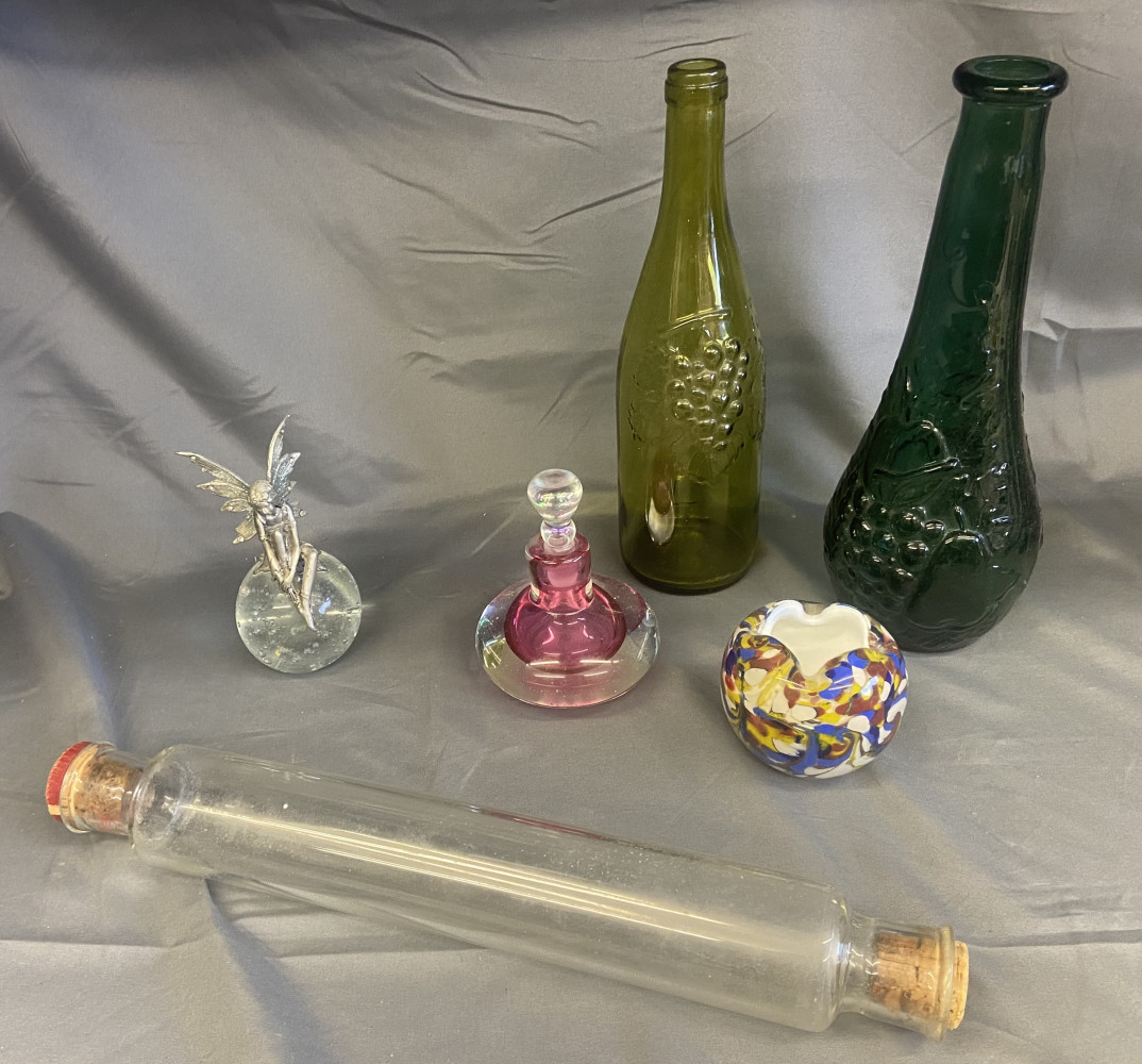 Marono paperweight, two bottles, bottle, fairy on ball and rare glass tube with cork ends