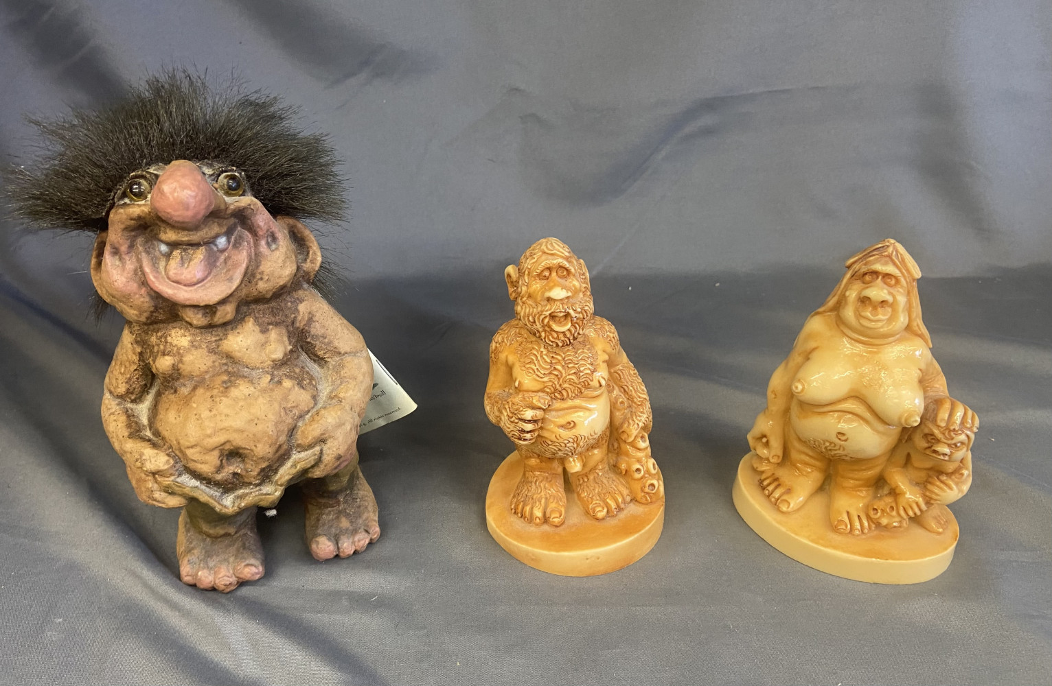 Original NyForm Troll And a pair of Giuseppe Armani “Neanderthal Family" figurines