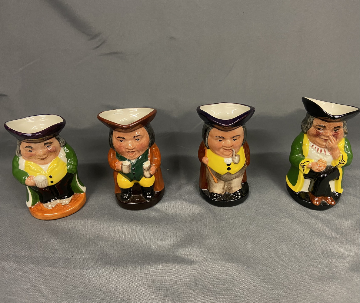Four small collectable Staffordshire Character Jugs