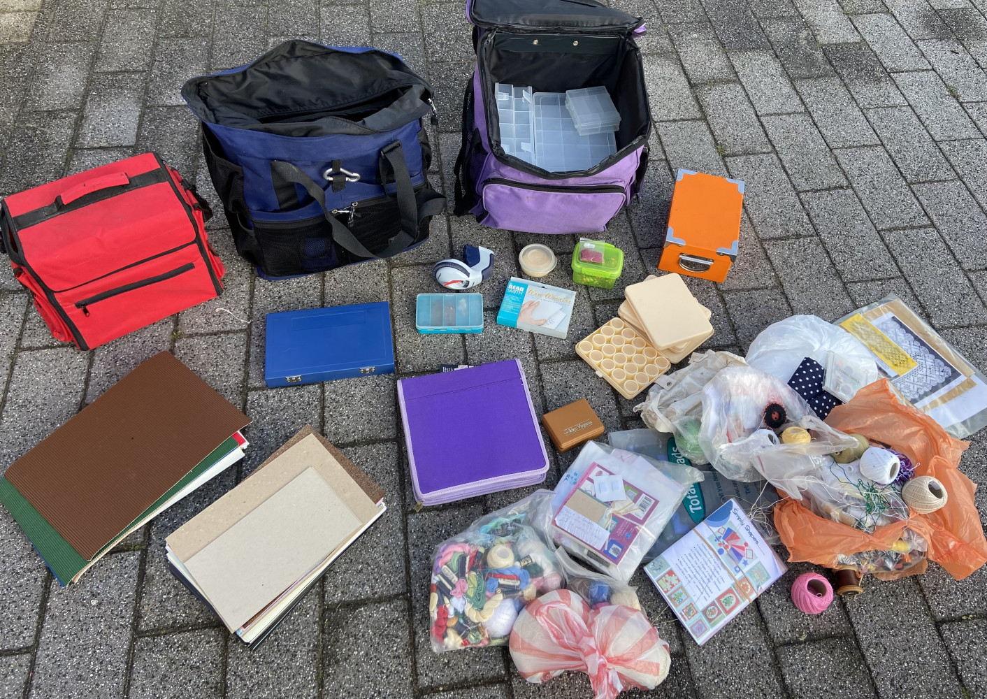 Three cases of various craft items