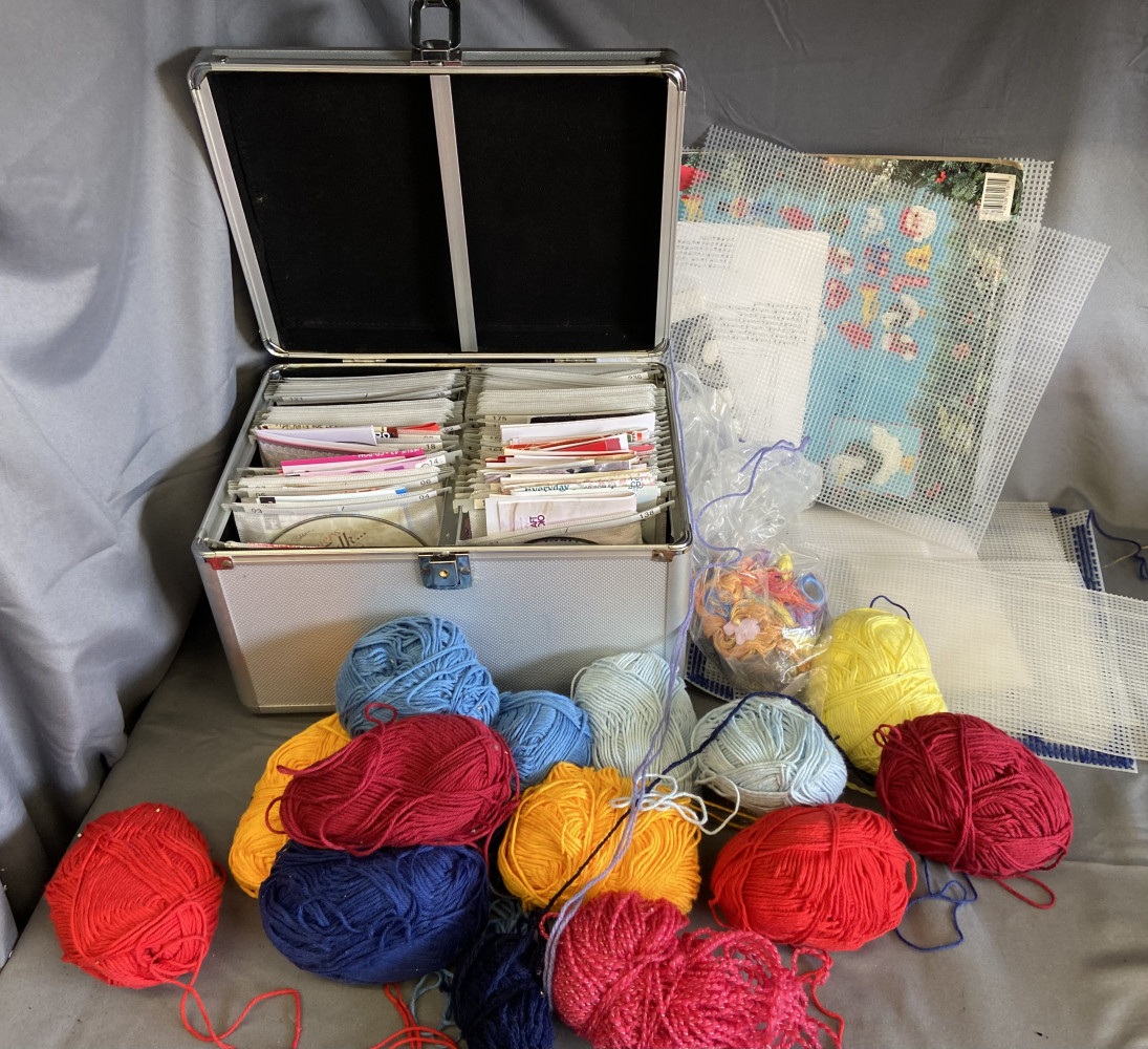 Collection of patterns and craft DVDs and wools