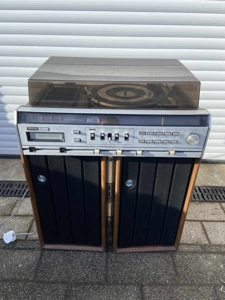 Winthrop Classic Stero, 8 track, and record player has very slight crack on back of casing