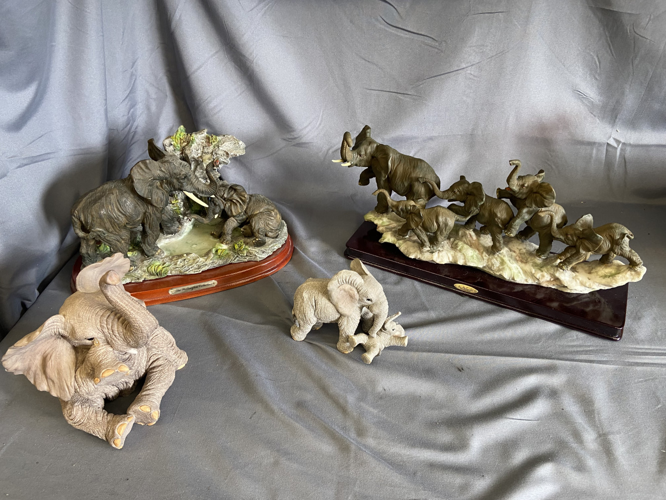 4 large elephants figures