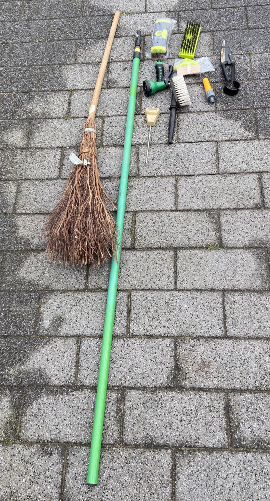 Long pole with accessories and witches broom